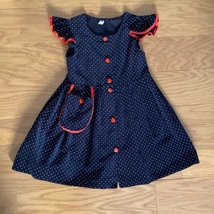 Black velvet and strawberry buttons dress